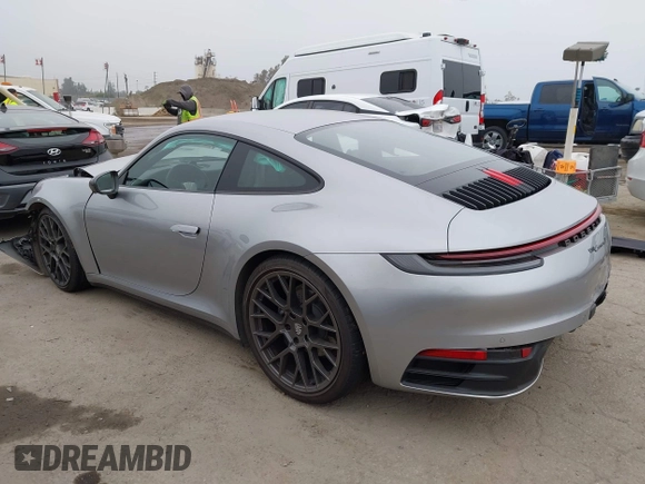 2023 Porsche 911 Carrera with VIN WP0AA2A93PS206048, listed as a IAAI auction lot 42022225 with 6,439 mi miles and . Bid and sale history available at DreamBid. Image 3.