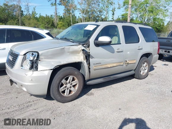 2010 GMC Yukon SLT with VIN 1GKMCCE3XAR225380, listed as a IAAI auction lot 41904723 with 173,686 mi miles. Bid and sale history available at carsss.com. Image 2.