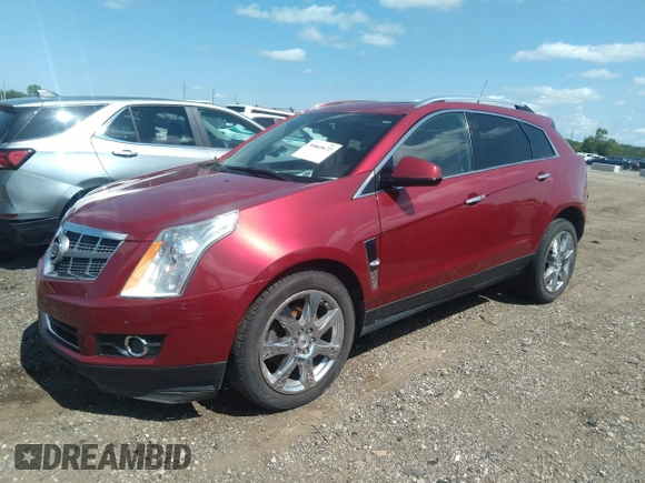 2011 Cadillac SRX Premium Collection with VIN 3GYFNCEY0BS609817, listed as a IAAI auction lot 39865672 with 114,665 mi miles. Bid and sale history available at carsss.com. Image 2.
