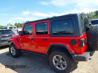 2019 Jeep Wrangler Unlimited Sahara with VIN 1C4HJXEG7KW551864, listed as a IAAI auction lot 42170875 with 115,695 mi miles and . Bid and sale history available at DreamBid. Image 13.