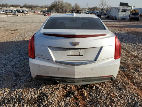2015 Cadillac ATS Luxury RWD z VIN 1G6AB5SA7F0135859, wystawiony jako Copart lot #48192085 z przebiegiem 42 077 mil mil oraz Szkoda całkowita • Salvage title. Historia ofert i sprzedaży dostępna na DreamBid. Obrazek 6.