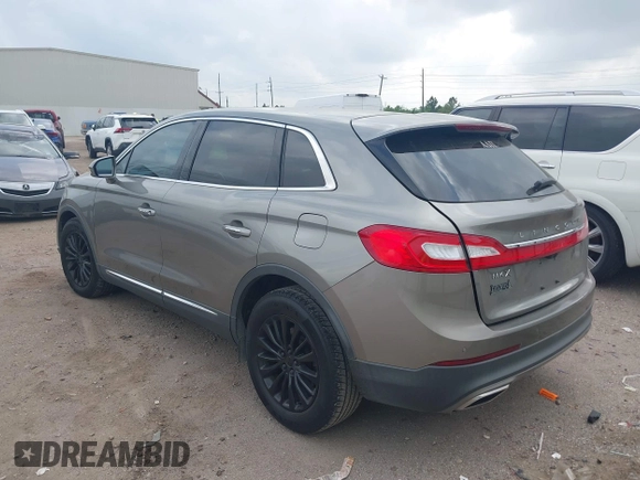 2016 Lincoln MKX Select with VIN 2LMTJ6KR8GBL63843, listed as a IAAI auction lot 41936801 with 96,829 mi miles. Bid and sale history available at carsss.com. Image 3.