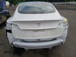 2023 Tesla Model 3 with VIN 5YJ3E1EA6PF563331, listed as a Copart auction lot 61124715 with 26,198 mi miles and Salvage title. Bid and sale history available at DreamBid. Image 6.