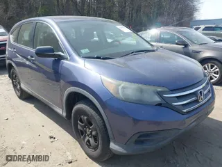2013 Honda CR-V LX with VIN 2HKRM4H38DH658563, listed as a IAAI auction lot 42076946 with 201,334 mi miles. Bid and sale history available at carsss.com. Image 1.