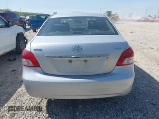 2009 Toyota Yaris with VIN JTDBT903X91301963, listed as a IAAI auction lot 42102283 with 143,966 mi miles. Bid and sale history available at carsss.com. Image 16.