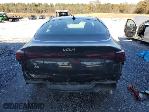 2025 Kia K5 LXS with VIN KNAG24J75S5283087, listed as a Copart auction lot 84616614 with 5,155 mi miles and Salvage Title. Bid and sale history available at carsss.com. Image 6.