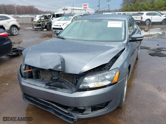 2013 Volkswagen Passat SE w/Sunroof with VIN 1VWBH7A38DC002096, listed as a IAAI auction lot 41904594 with 134,738 mi miles. Bid and sale history available at carsss.com. Image 2.