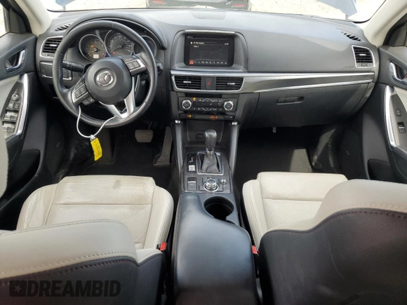 2016 Mazda CX-5 Grand Touring with VIN JM3KE4DY4G0750939, listed as a Copart auction lot 52727395 with 72,428 mi miles and Salvage Title. Bid and sale history available at carsss.com. Image 8.