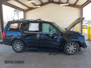 2003 Lincoln Navigator Luxury with VIN 5LMFU28R53LJ48895, listed as a IAAI auction lot 41670029 with 147,702 mi miles. Bid and sale history available at carsss.com. Image 14.