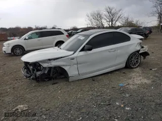 2011 BMW 1 Series 135i with VIN WBAUC9C58BVM10505, listed as a Copart auction lot 82564374 with 123,144 mi miles and Salvage Title. Bid and sale history available at carsss.com. Image 1.
