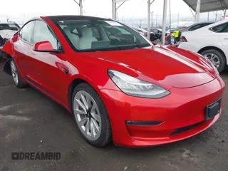 2021 Tesla Model 3 Long Range with VIN 5YJ3E1EB3MF862392, listed as a IAAI auction lot 41765987 with 51,915 mi miles and . Bid and sale history available at DreamBid. Image 1.