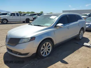 2013 Lincoln MKT with VIN 2LMHJ5FK3DBL59384, listed as a IAAI auction lot 42099478 with 187,367 mi miles and . Bid and sale history available at DreamBid. Image 2.