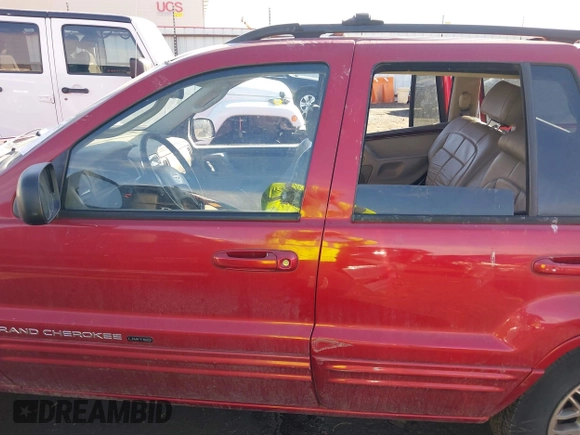 2002 Jeep Grand Cherokee Limited with VIN 1J4GX58S82C228062, listed as a IAAI auction lot 41657705 with 168,991 mi miles and . Bid and sale history available at DreamBid. Image 15.