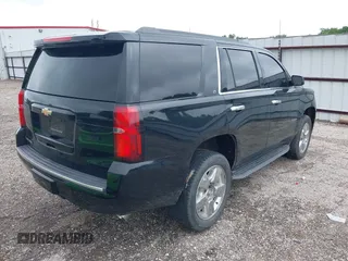 2017 Chevrolet Tahoe LT with VIN 1GNSCBKCXHR342170, listed as a IAAI auction lot 42137766 with 76,854 mi miles and . Bid and sale history available at DreamBid. Image 4.