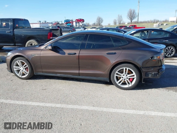 2014 Tesla Model S 60 with VIN 5YJSA1H17EFP33275, listed as a IAAI auction lot 41778167 with 202,749 mi miles and . Bid and sale history available at DreamBid. Image 14.