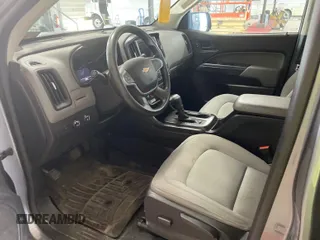 2021 Chevrolet Colorado 4WD Work Truck with VIN 1GCGTBEN0M1131662, listed as a IAAI auction lot 42788983 with 78,205 mi miles and . Bid and sale history available at DreamBid. Image 5.