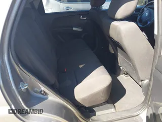 2010 Kia Sportage LX with VIN KNDKGCA38A7733453, listed as a IAAI auction lot 41932937 with 148,056 mi miles and . Bid and sale history available at carsss.com. Image 8.