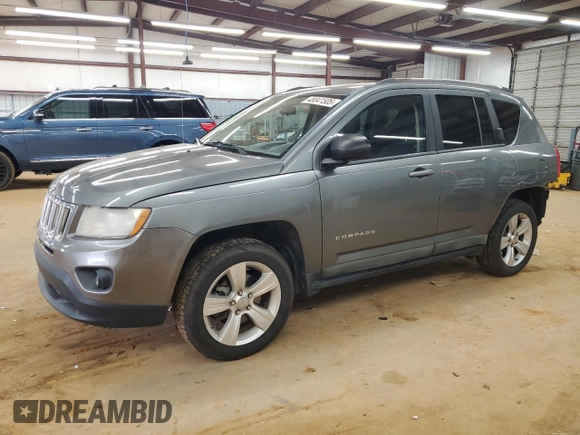 2012 Jeep Compass Sport with VIN 1C4NJCBB2CD505361, listed as a Copart auction lot 48041505 with 167,464 mi miles and Salvage Title. Bid and sale history available at carsss.com. Image 1.