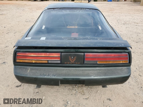 1991 Pontiac Firebird z VIN 1G2FS23T9ML201636, wystawiony jako Copart lot #53856725 z przebiegiem 1 278 739 mil mil oraz Czysty tytuł • Clean title. Historia ofert i sprzedaży dostępna na DreamBid. Obrazek 6.