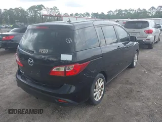 2013 Mazda 5 Sport with VIN JM1CW2BL8D0145422, listed as a IAAI auction lot 42823178 with 161,899 mi miles and . Bid and sale history available at DreamBid. Image 4.