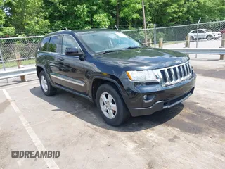 2011 Jeep Grand Cherokee Laredo with VIN 1J4RS4GG5BC534960, listed as a IAAI auction lot 42277395 with 223,690 mi miles and . Bid and sale history available at DreamBid. Image 1.