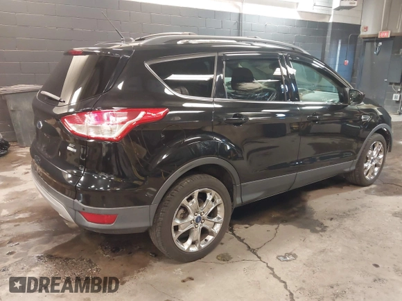 2014 Ford Escape SE with VIN 1FMCU9GX7EUA80983, listed as a IAAI auction lot 41504942 with 133,952 mi miles. Bid and sale history available at carsss.com. Image 4.