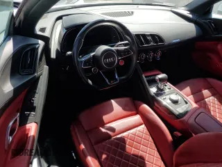 2018 Audi R8 z VIN WUAVACFX1J7900121, wystawiony jako Copart lot #75092964 z przebiegiem Nie podano mil oraz Szkody całkowita. Historia ofert i sprzedaży dostępna na DreamBid. Obrazek 8.