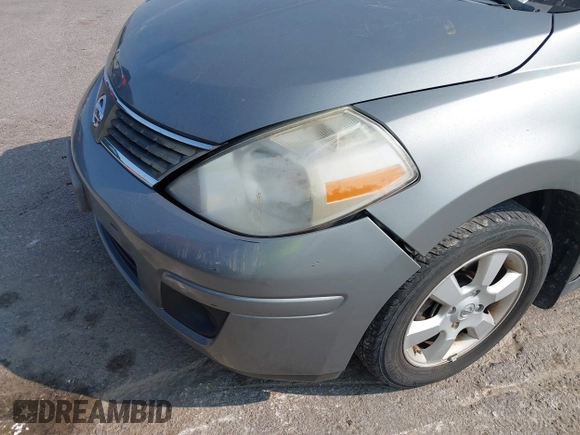 2007 Nissan Versa SL with VIN 3N1BC11E47L404371, listed as a IAAI auction lot 40309667 with 131,954 mi miles and . Bid and sale history available at DreamBid. Image 6.