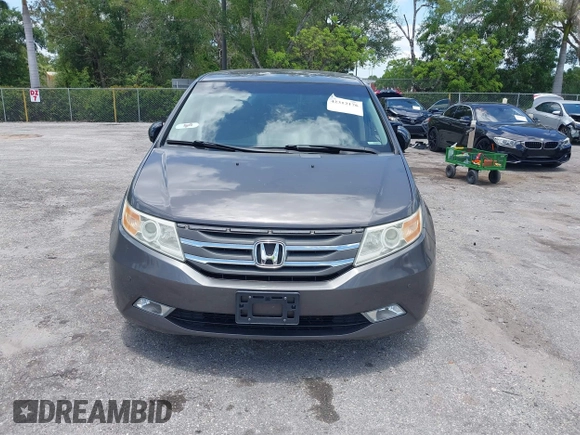 2013 Honda Odyssey Touring with VIN 5FNRL5H96DB068843, listed as a IAAI auction lot 42312176 with 115,804 mi miles and . Bid and sale history available at DreamBid. Image 13.
