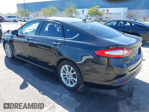2015 Ford Fusion SE Hybrid with VIN 3FA6P0LU9FR294551, listed as a IAAI auction lot 41545007 with 179,906 mi miles. Bid and sale history available at carsss.com. Image 3.