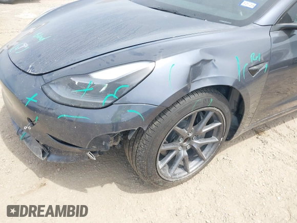 2023 Tesla Model 3 with VIN 5YJ3E1EA5PF565071, listed as a IAAI auction lot 42232719 with 15,389 mi miles and . Bid and sale history available at DreamBid. Image 6.