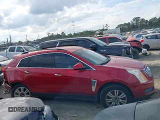 2015 Cadillac SRX z VIN 3GYFNAE3XFS572970, wystawiony jako IAAI lot #40854902 z przebiegiem 124 779 mil mil oraz . Historia ofert i sprzedaży dostępna na DreamBid. Obrazek 12.
