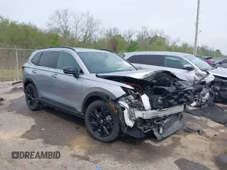 2023 Honda CR-V Sport Touring with VIN 7FARS6H99PE012574, listed as a IAAI auction lot 41896401 with 13,035 mi miles and . Bid and sale history available at DreamBid. Image 1.