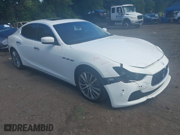 2015 Maserati Ghibli with VIN ZAM57XSA4F1148845, listed as a IAAI auction lot 42605057 with 69,446 mi miles and . Bid and sale history available at DreamBid. Image 1.