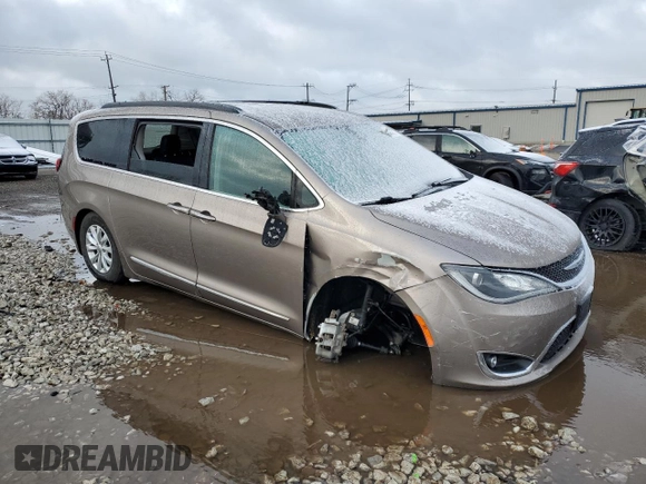 2017 Chrysler Pacifica Touring L with VIN 2C4RC1BG6HR537536, listed as a Copart auction lot 49702695 with 123,599 mi miles and Salvage Title. Bid and sale history available at DreamBid. Image 4.