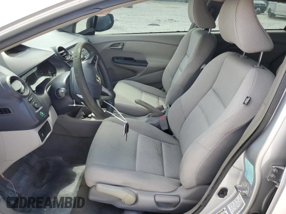 2010 Honda Insight EX with VIN JHMZE2H74AS032878, listed as a Copart auction lot 56230795 with 125,838 mi miles and Clean title. Bid and sale history available at DreamBid. Image 7.