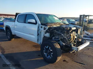 2019 Toyota Tacoma 4WD SR5 with VIN 3TMDZ5BN3KM063770, listed as a IAAI auction lot 41421349 with 156,948 mi miles. Bid and sale history available at carsss.com. Image 1.