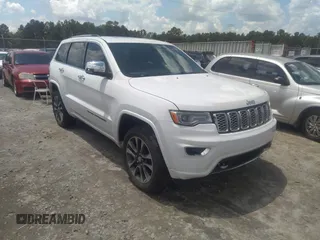 2018 Jeep Grand Cherokee Overland z VIN 1C4RJFCG0JC326025, wystawiony jako IAAI lot #42387079 z przebiegiem 182 046 mil mil oraz . Historia ofert i sprzedaży dostępna na DreamBid. Obrazek 1.