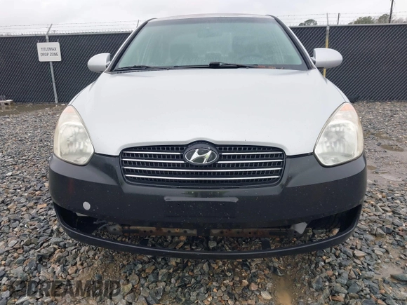 2006 Hyundai Accent GLS with VIN KMHCN46C46U035208, listed as a IAAI auction lot 41769016 with 141,065 mi miles. Bid and sale history available at carsss.com. Image 6.