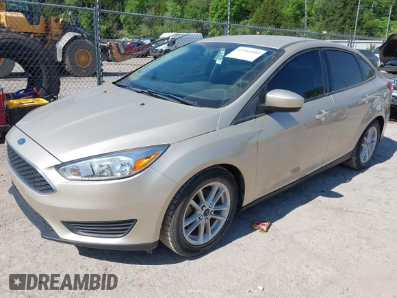 2018 Ford Focus SE z VIN 1FADP3FEXJL210905, wystawiony jako IAAI lot #42264105 z przebiegiem 136 499 mil mil oraz . Historia ofert i sprzedaży dostępna na DreamBid. Obrazek 17.