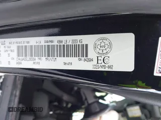 2014 Jeep Wrangler Sport with VIN 1C4AJWAG5EL285994, listed as a IAAI auction lot 41558673 with 98,779 mi miles and . Bid and sale history available at DreamBid. Image 9.