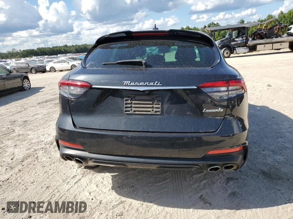 2022 Maserati Levante GT with VIN ZN661XUA9NX384716, listed as a Copart auction lot 69743654 with Not provided miles and Salvage title. Bid and sale history available at DreamBid. Image 6.