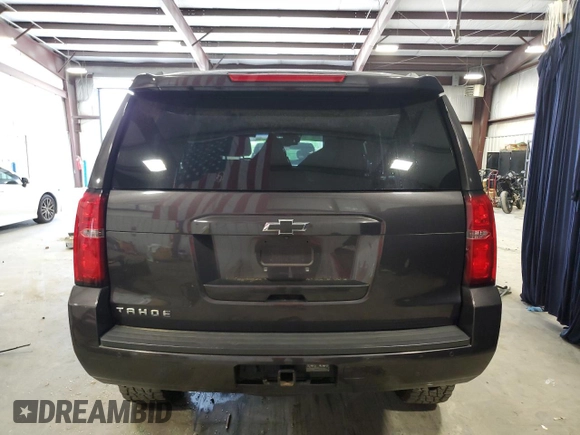 2015 Chevrolet Tahoe LT with VIN 1GNSCBKC3FR112306, listed as a Copart auction lot 51282355 with 136,492 mi miles and Salvage Title. Bid and sale history available at DreamBid. Image 6.