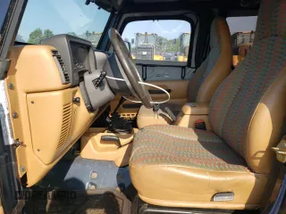 1997 Jeep Wrangler SE z VIN 1J4FY29PXVP464548, wystawiony jako Copart lot #59430535 z przebiegiem 183 412 mil mil oraz Czysty tytuł • Clean title. Historia ofert i sprzedaży dostępna na DreamBid. Obrazek 7.