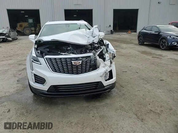 2020 Cadillac XT5 Luxury FWD z VIN 1GYKNAR41LZ203866, wystawiony jako Copart lot #86615234 z przebiegiem 45 367 mil mil oraz Nie do naprawy • Non repairable. Historia ofert i sprzedaży dostępna na DreamBid. Obrazek 14.
