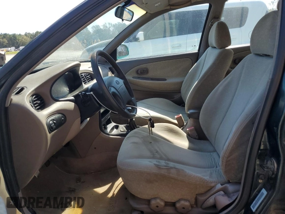 2000 Hyundai Elantra GLS z VIN KMHJF35FXYU998689, wystawiony jako Copart lot #76181814 z przebiegiem 154 743 mil mil oraz Szkoda całkowita • Salvage title. Historia ofert i sprzedaży dostępna na DreamBid. Obrazek 7.