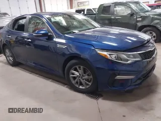 2019 Kia Optima LX z VIN 5XXGT4L3XKG334248, wystawiony jako IAAI lot #41901778 z przebiegiem 62 065 mil mil oraz . Historia ofert i sprzedaży dostępna na DreamBid. Obrazek 1.