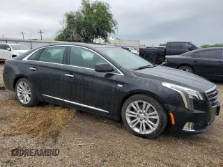 2019 Cadillac XTS Luxury z VIN 2G61M5S3XK9133339, wystawiony jako Copart lot #52651365 z przebiegiem 124 041 mil mil oraz Szkoda całkowita • Salvage title. Historia ofert i sprzedaży dostępna na DreamBid. Obrazek 4.