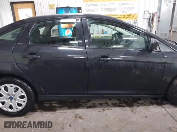 2012 Ford Focus SE с VIN 1FAHP3F22CL394151, выставлен на аукционе IAAI как лот 42146644 с пробегом 79 433 миль миль и . История ставок и продаж доступна на DreamBid. Изображение 14.