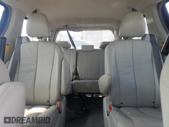 2014 Toyota Sienna Limited z VIN 5TDDK3DC2ES075367, wystawiony jako Copart lot #54010085 z przebiegiem 148 312 mil mil oraz Szkoda całkowita • Salvage title. Historia ofert i sprzedaży dostępna na DreamBid. Obrazek 10.